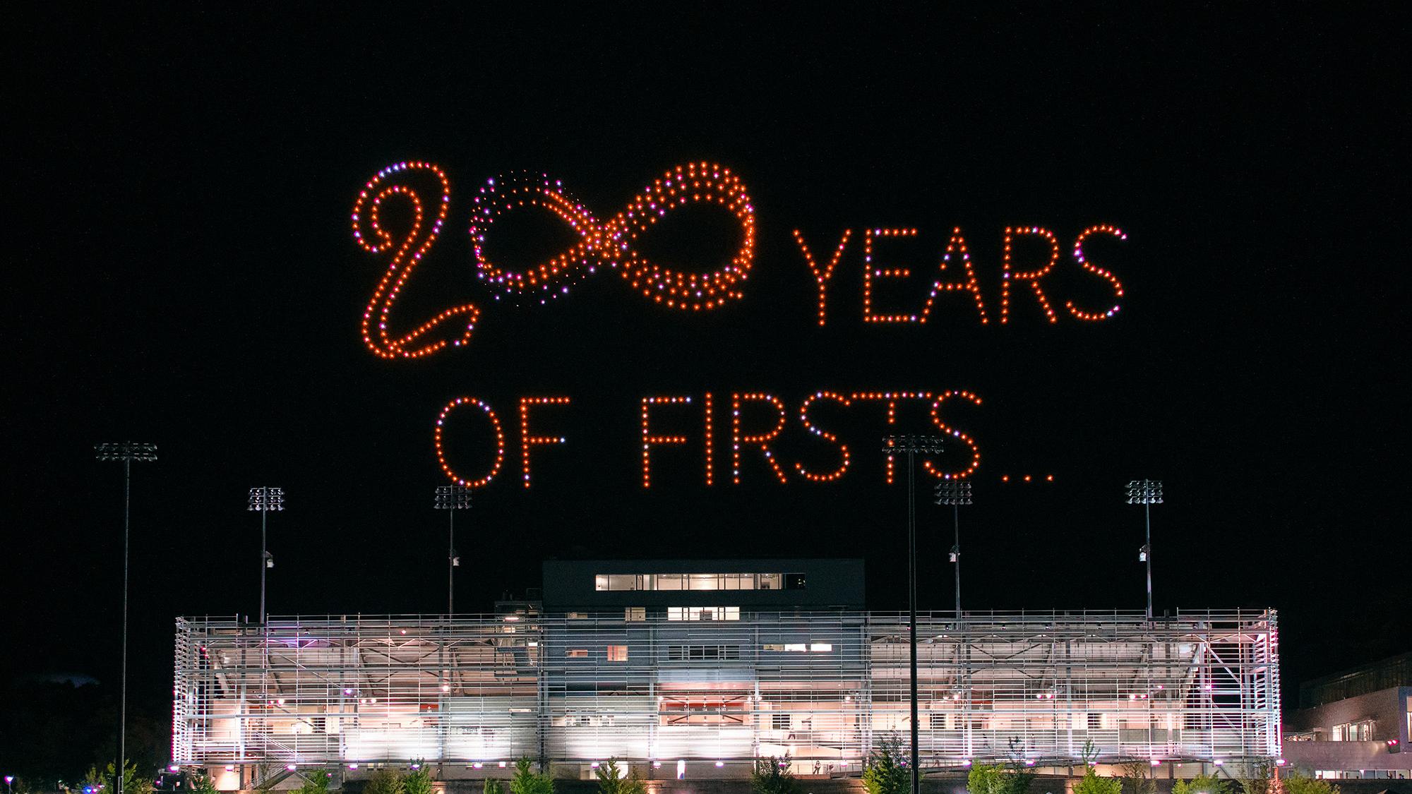 200 Years of Firsts spelled out with drones