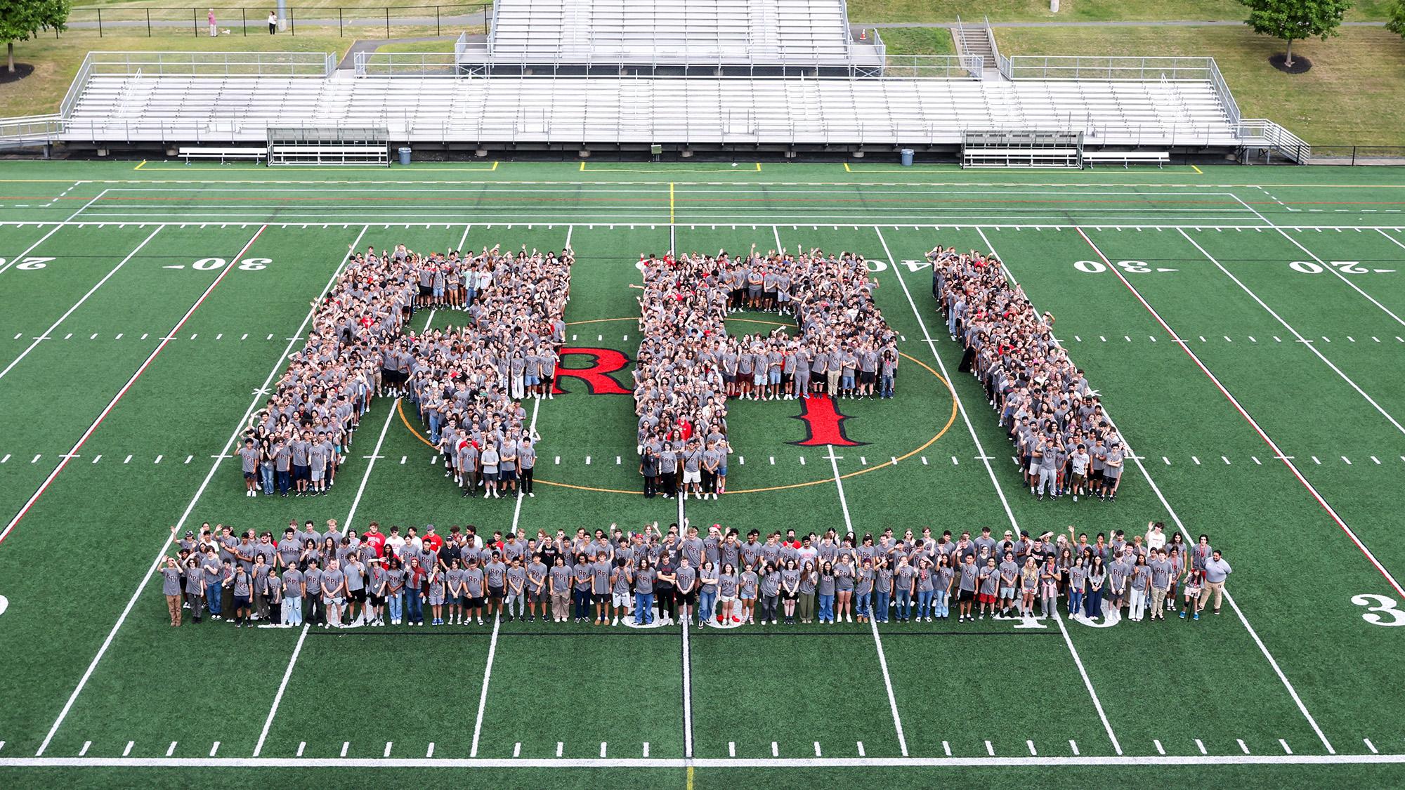 RPI freshman class recreate the new logo on the football field