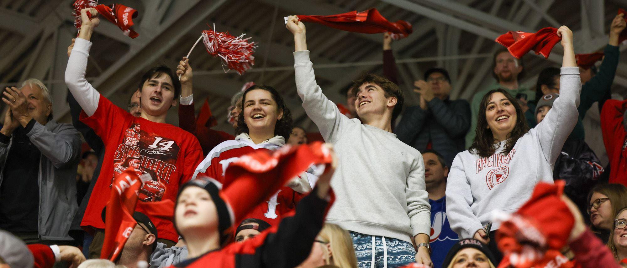 Students cheering at an athletics event