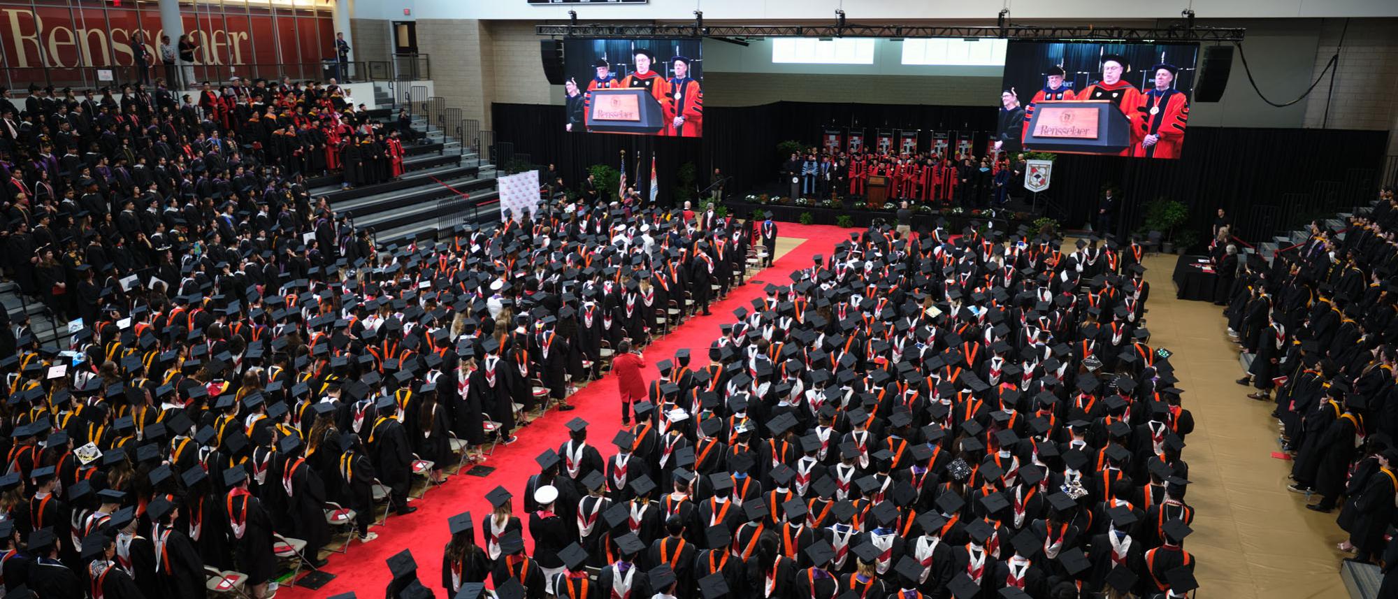 Photo of stage and the students during the commencement