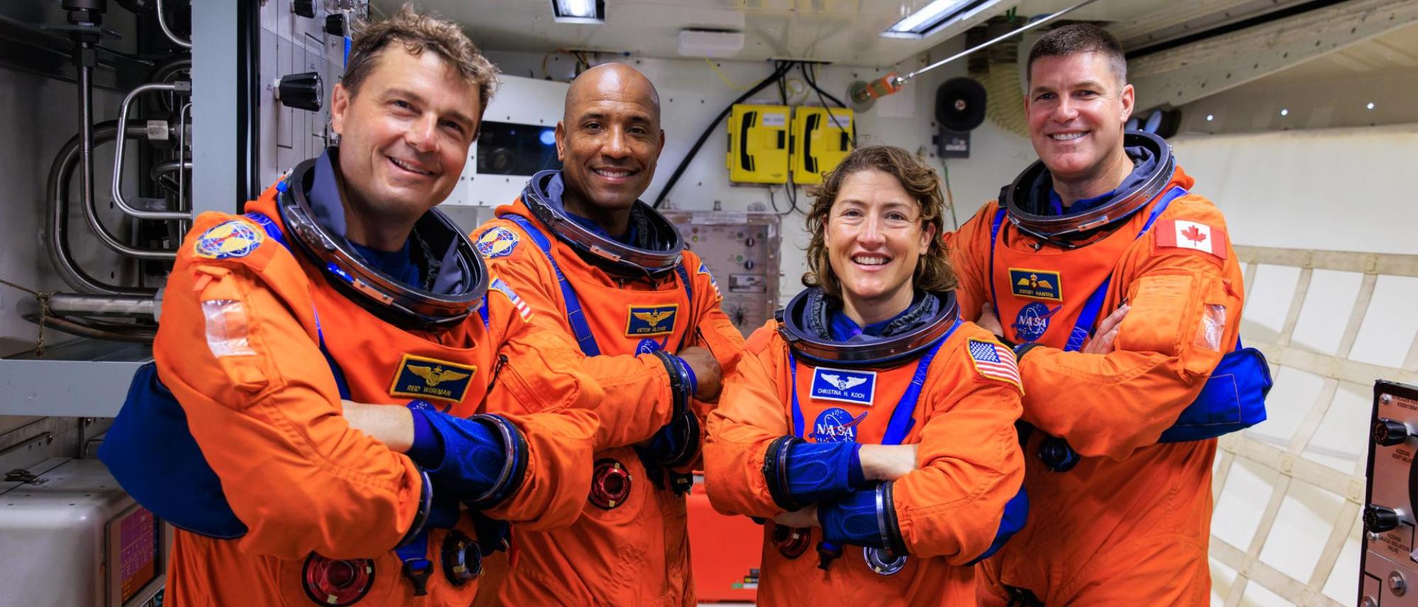 Artemis II NASA astronauts (left to right) Reid Wiseman, Victor Glover, and Christina Koch, and CSA (Canadian Space Agency) astronaut Jeremy Hansen stand in the white room on the crew access arm of the mobile launcher at Launch Pad 39B