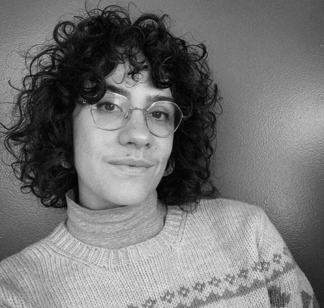 A black and white portrait of Raquel Velho