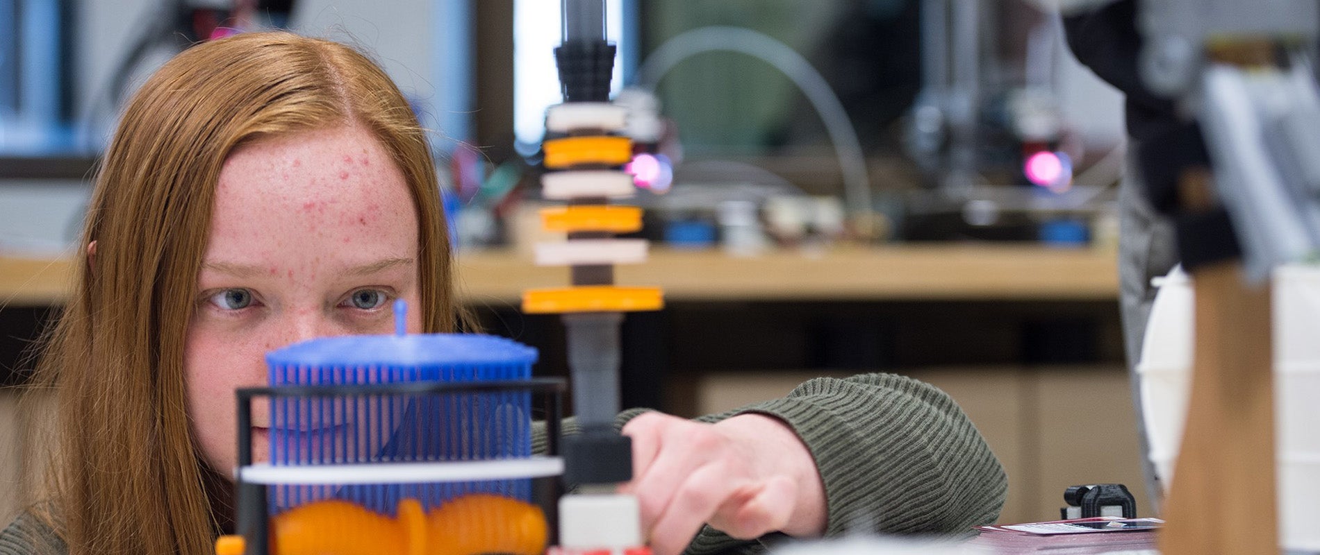 Student working with equipment